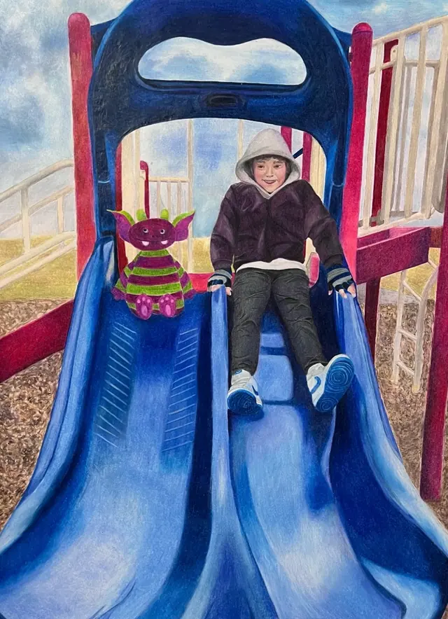 Detailed color drawing of a smiling child on a blue playground slide next to a purple and green striped monster toy